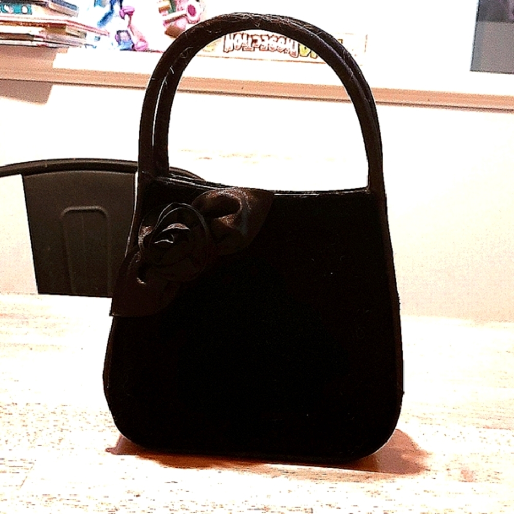 Small black dressy clutch